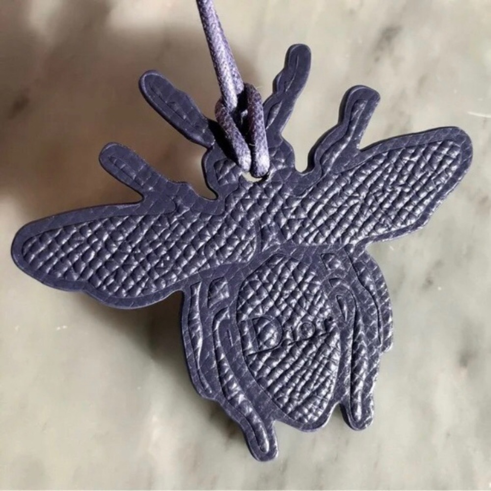 Authentic & New Christian Dior blue leather bee bag charm/key chain